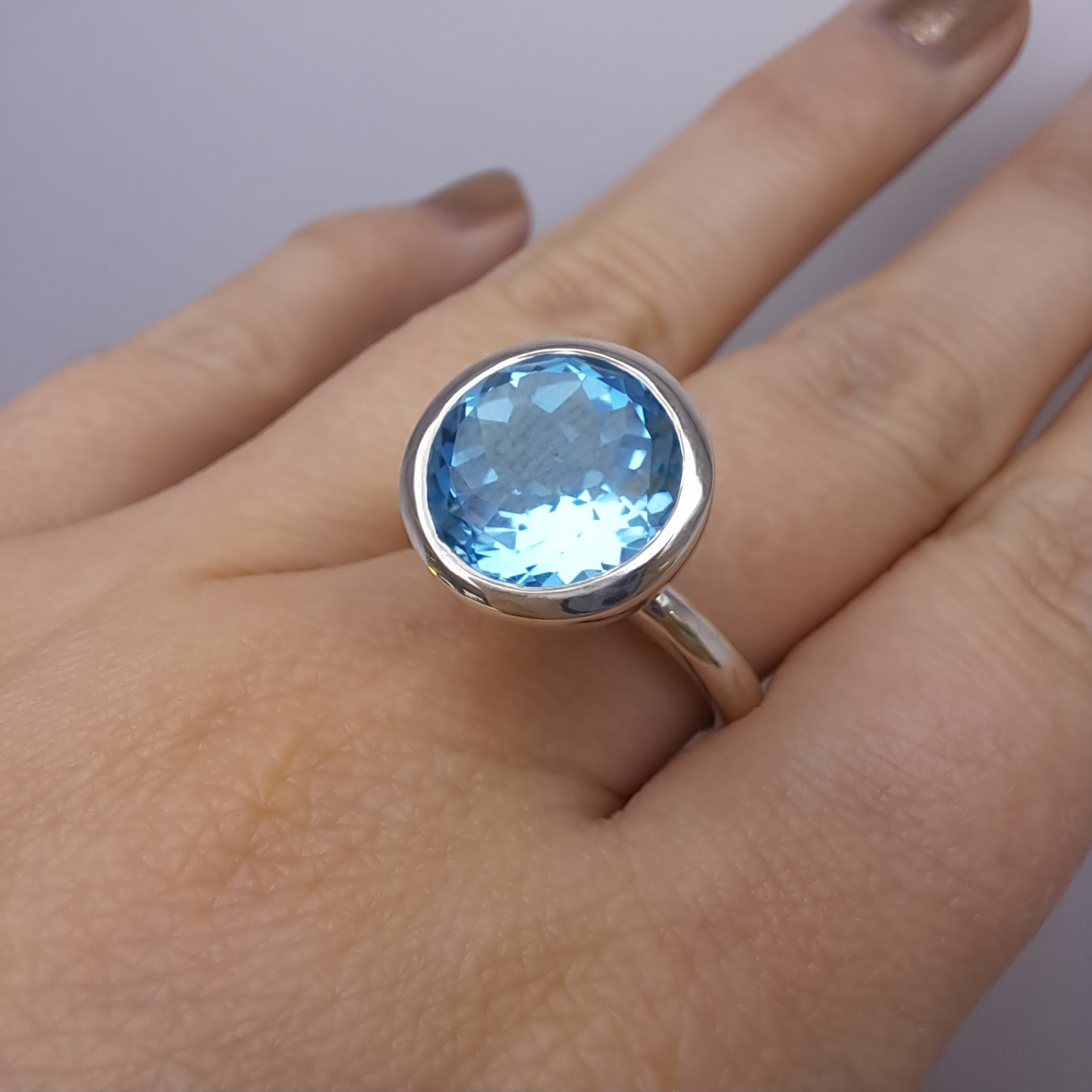 Silver 12mm Bright Blue Topaz Ring