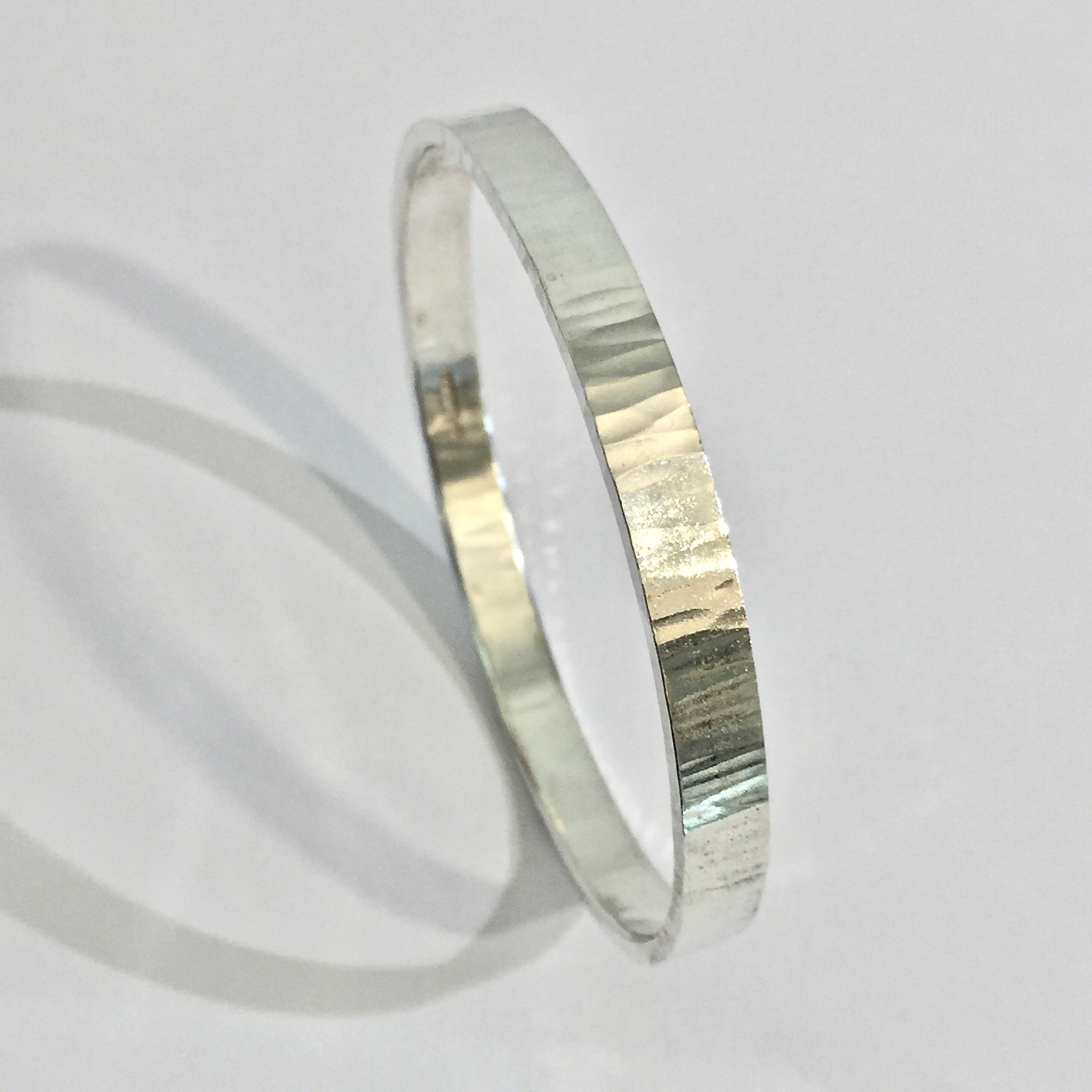 Silver  Round, Med Strip, Bark Hammered Bangle